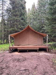 Colorado Lodge Tent Toast set on deck in woods
