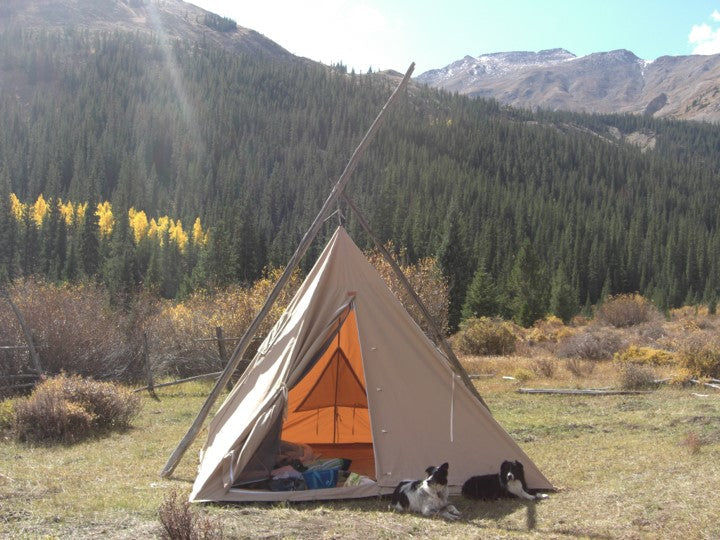 Cowboy Tipi in mountain setting with natural timber frame