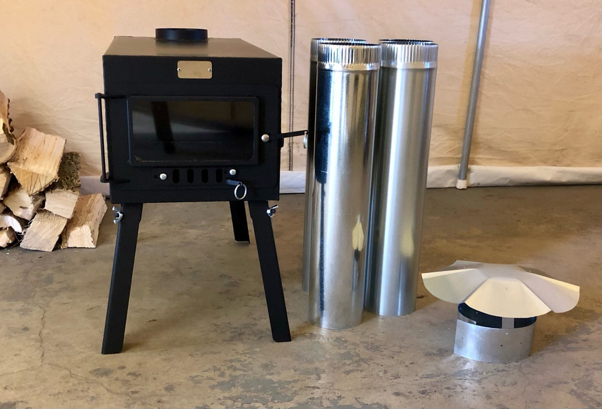 Explorer Wood Stove Kit by North Woods Fabrication, side view with galvanized stove pipe and rain cap