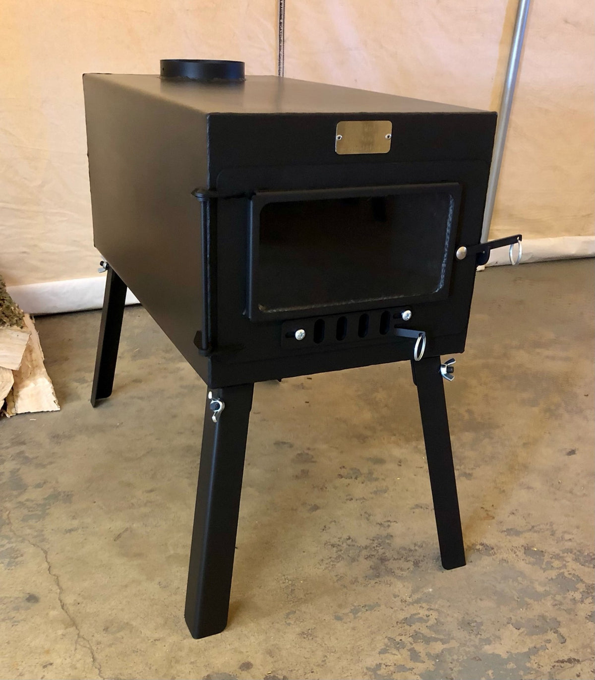 Explorer Wood Stove Kit by North Woods Fabrication, front three-quarter view