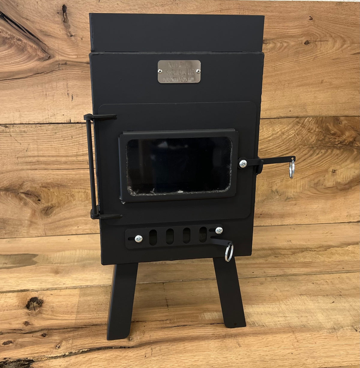 Sauna Wood Stove Kit by North Woods Fabrication, front view with glass door