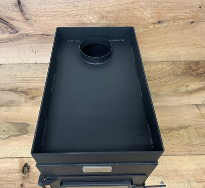 Sauna Wood Stove Kit by North Woods Fabrication, rock tray and flue collar from above