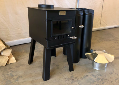 Woodsman Stove Kit by North Woods Fabrication, three-quarter view with stove pipe and rain cap
