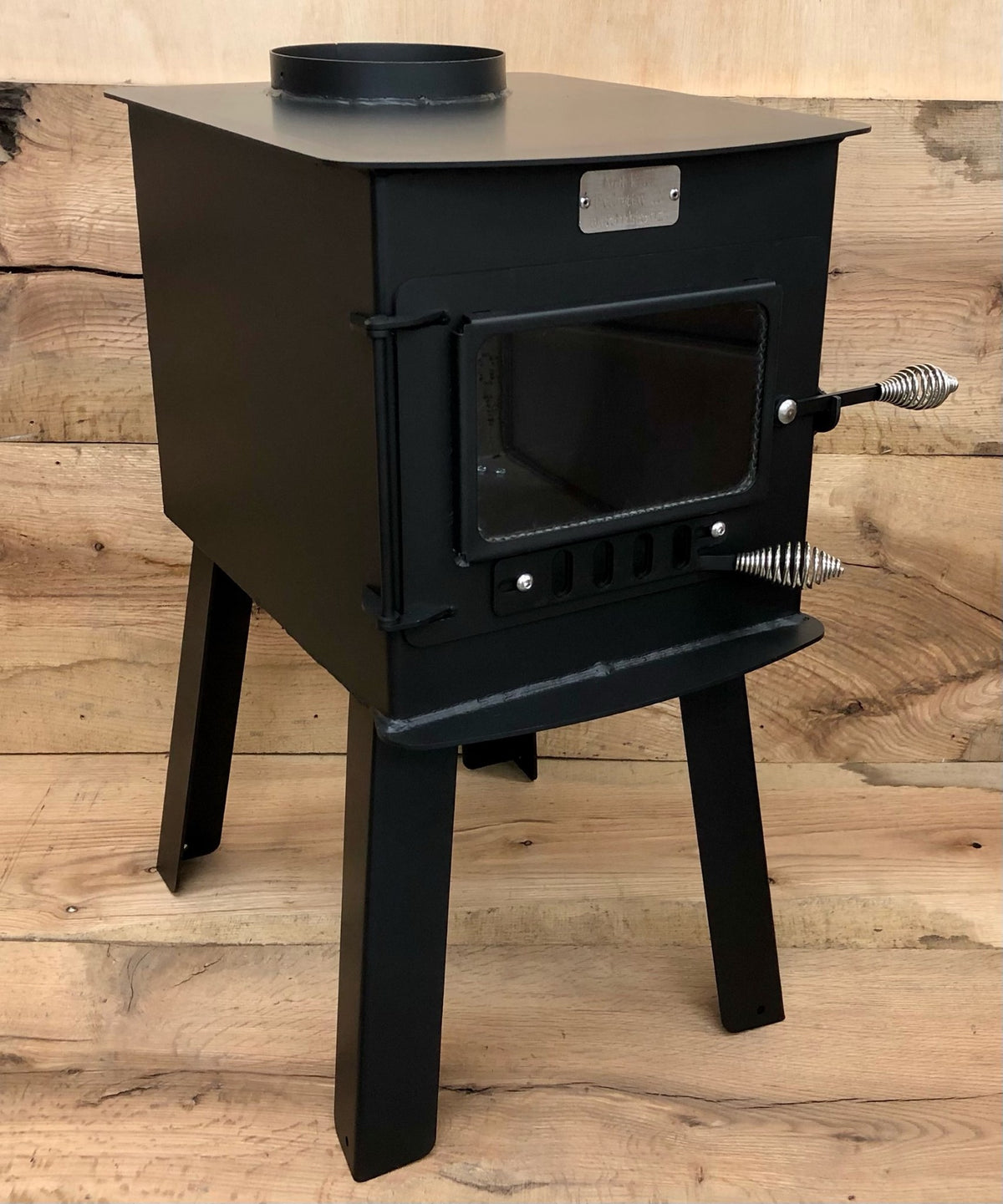 Woodsman Stove Kit by North Woods Fabrication, front three-quarter view