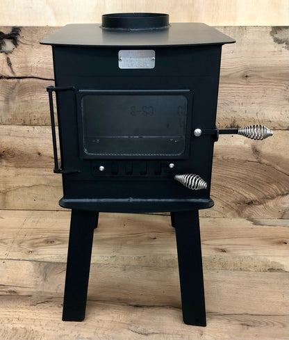 Woodsman Stove Kit by North Woods Fabrication, front view with glass door