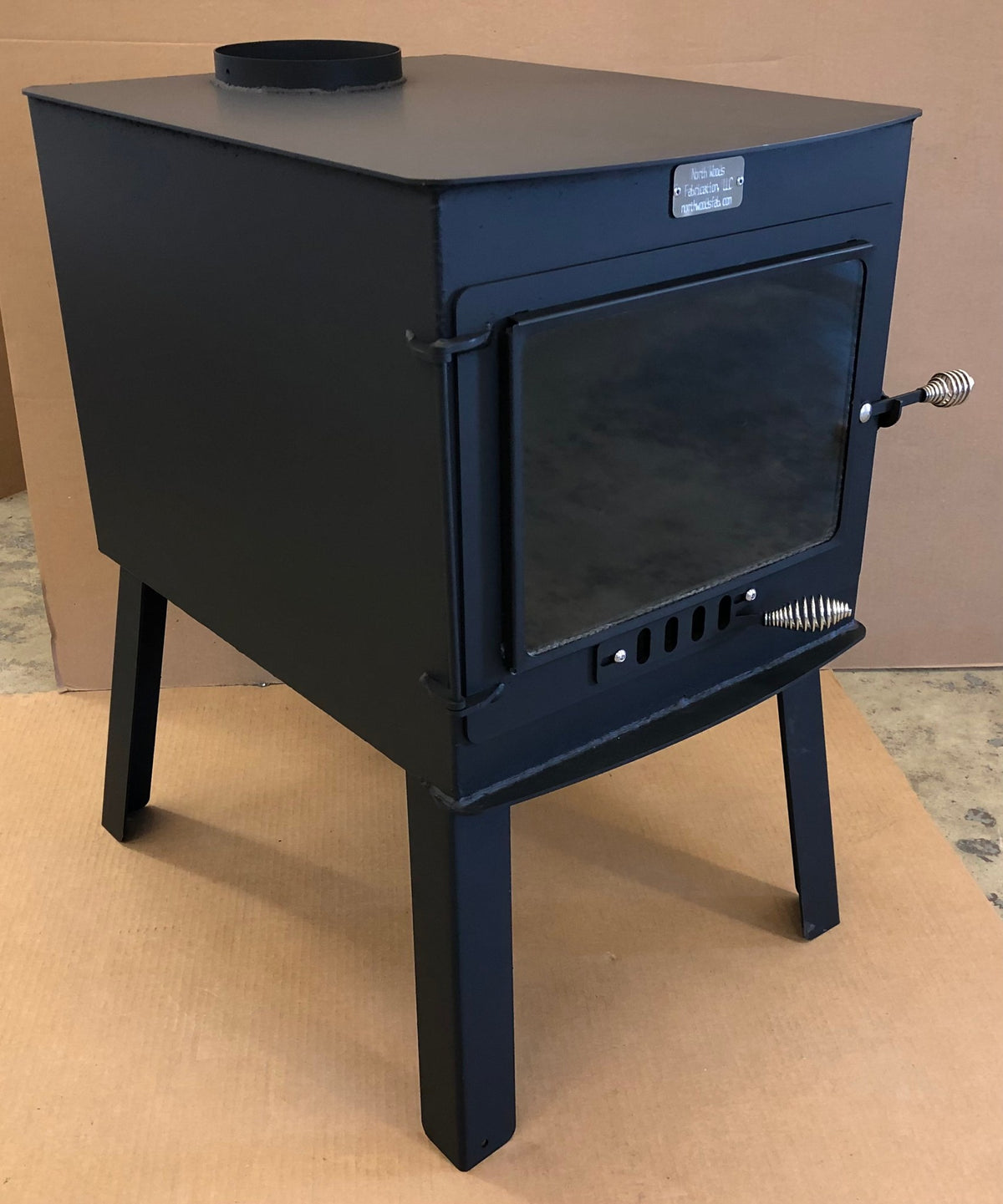 Woodsman XXL Wood Stove by North Woods Fabrication, three-quarter view from the right