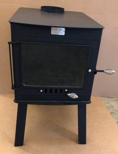 Woodsman XXL Wood Stove by North Woods Fabrication, front view with the large glass door
