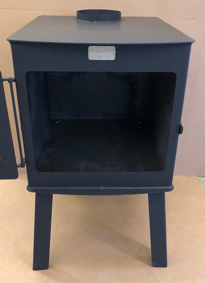 Woodsman XXL Wood Stove by North Woods Fabrication, door open to the firebox