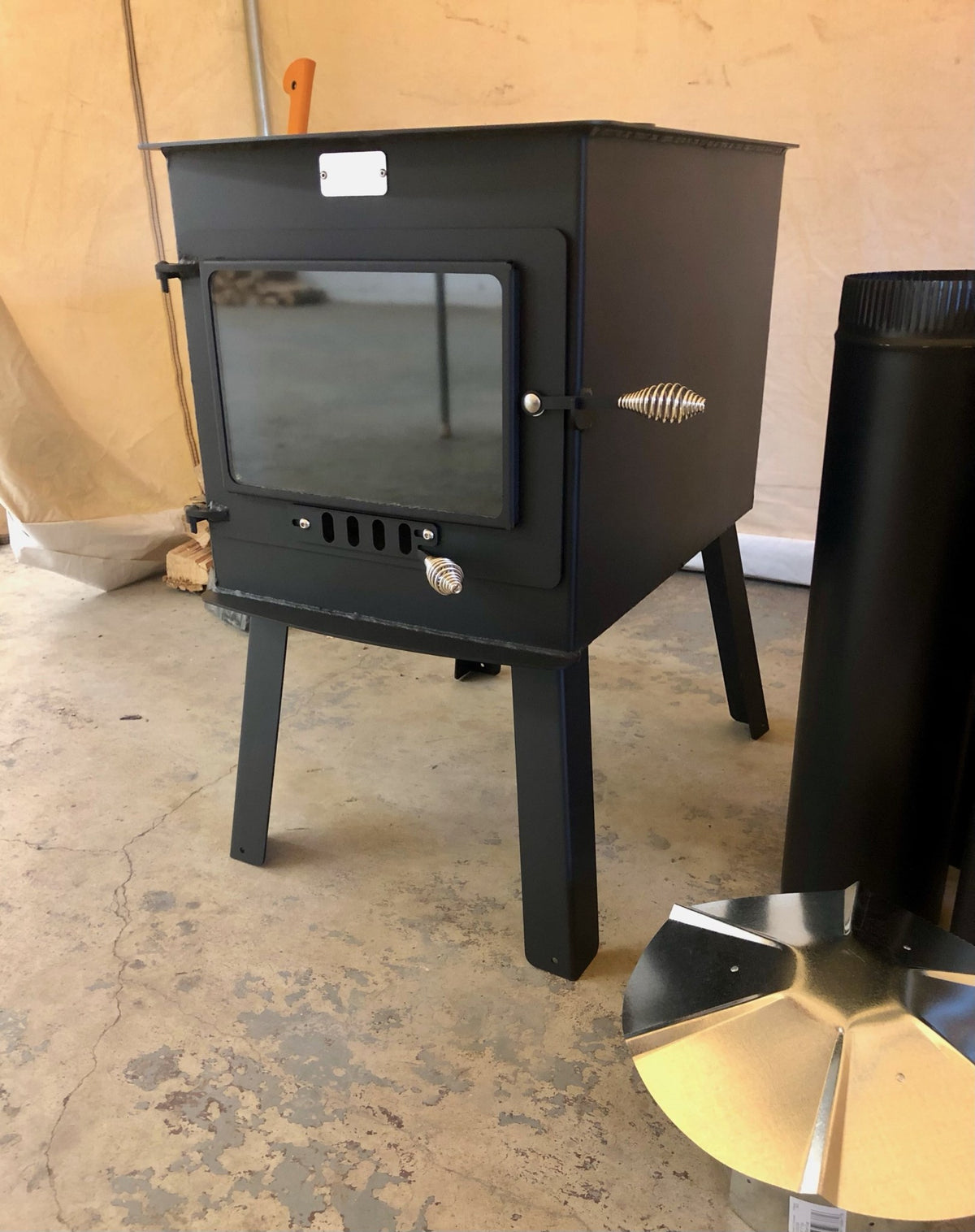 Woodsman XXL Stove Kit by North Woods Fabrication, the stove in the 16x20 bundle