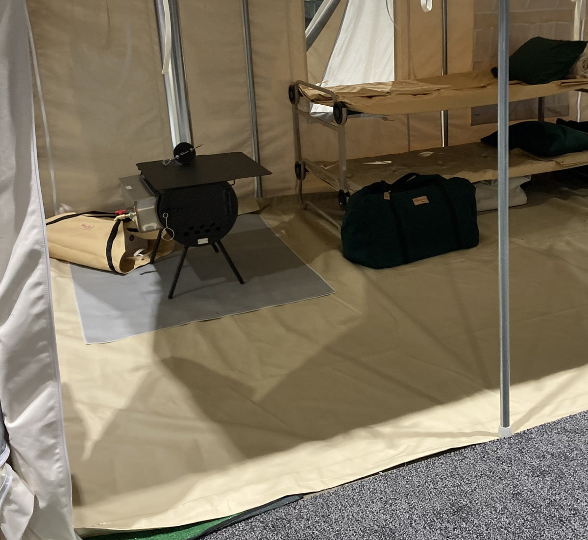 Stove Mat under a wood stove on a wall tent floor